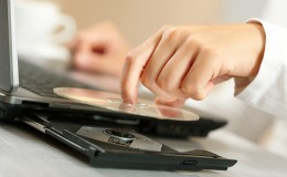 Woman hand with CD